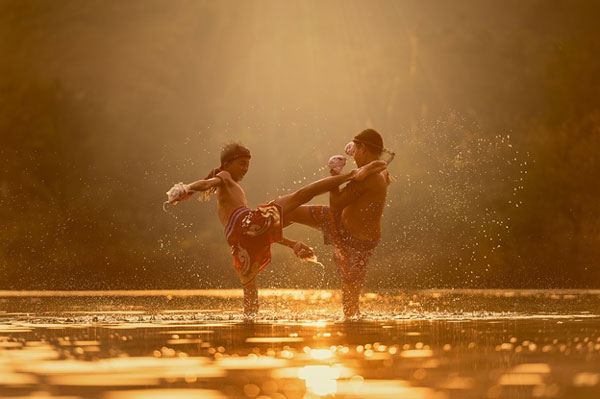 Two Kids fighting in Water